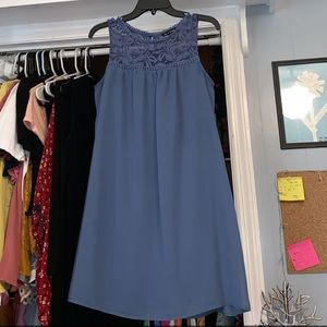 Short sleeveless dress.